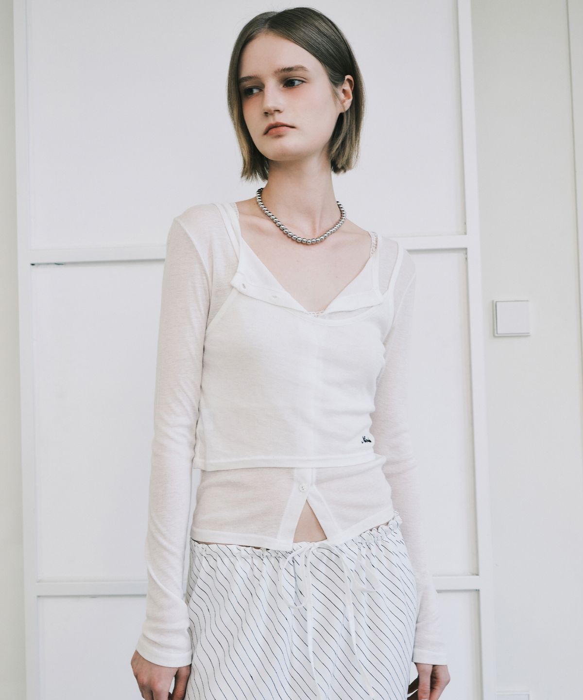 닉앤니콜(NICK&NICOLE) HENLEY NECK LAYERED SLEEVE TOP_IVORY