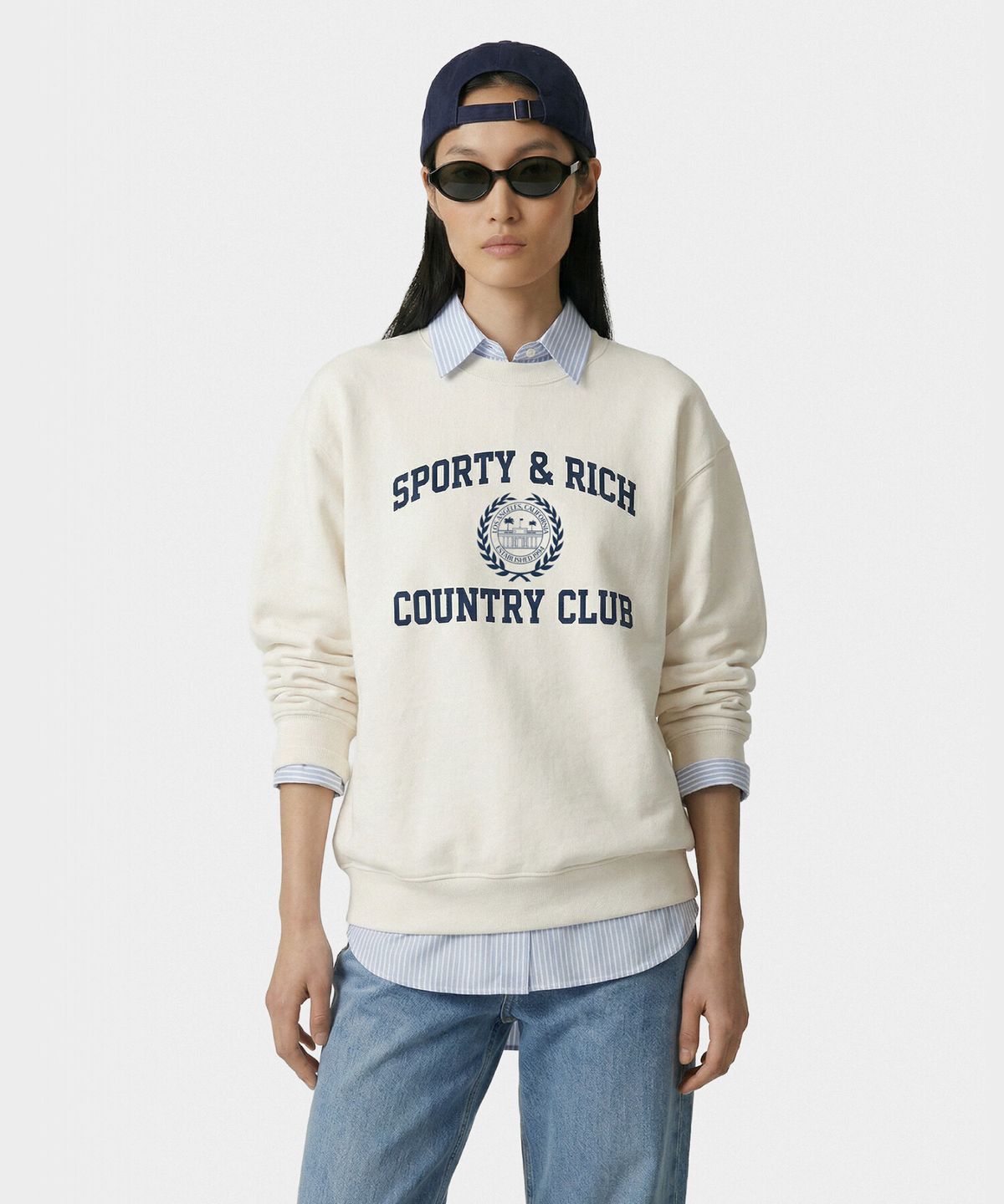 스포티앤리치(SPORTY&RICH) 바시티 크레스트 크루넥 남여공용 크림 R265AUW006