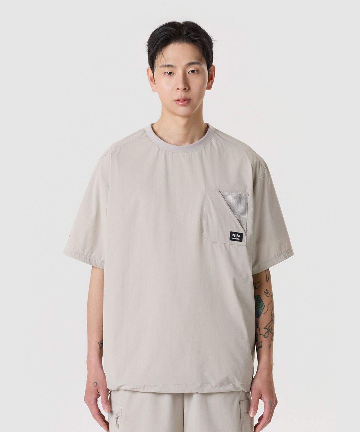 엄브로(UMBRO) [COOLING] 칠아웃 반팔 피스테 베이지 UR223CWT62
