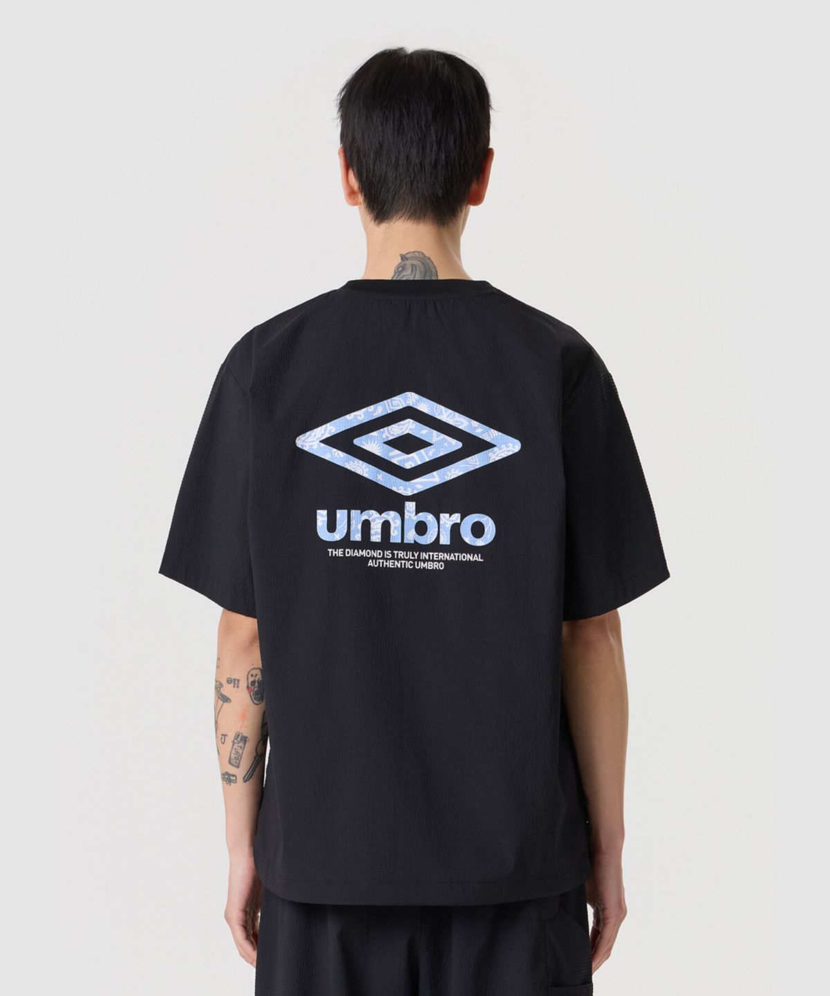 엄브로(UMBRO) 시어서커 반팔 피스테 블랙 UR223CWT64