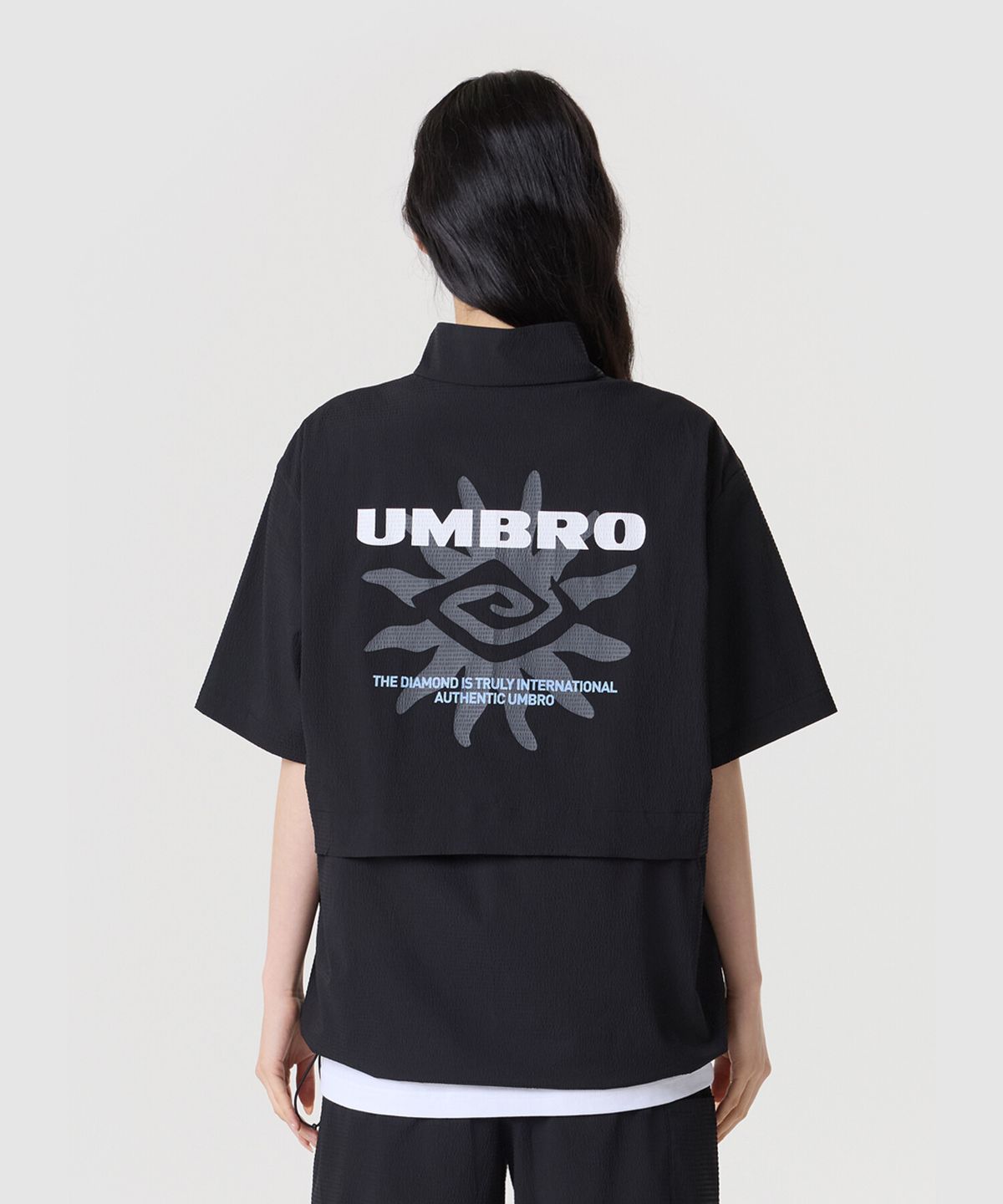 엄브로(UMBRO) 시어서커 반팔 스탠넥 아노락 블랙 UR221CWT63