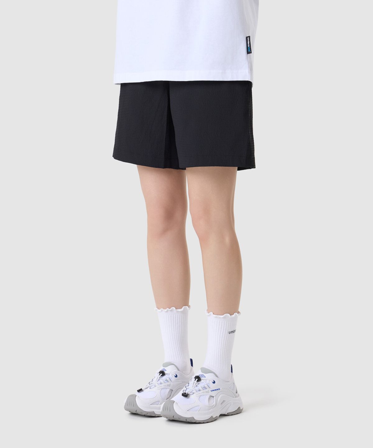 엄브로(UMBRO) 시어서커 4.5부 반바지 블랙 UR223CHP63