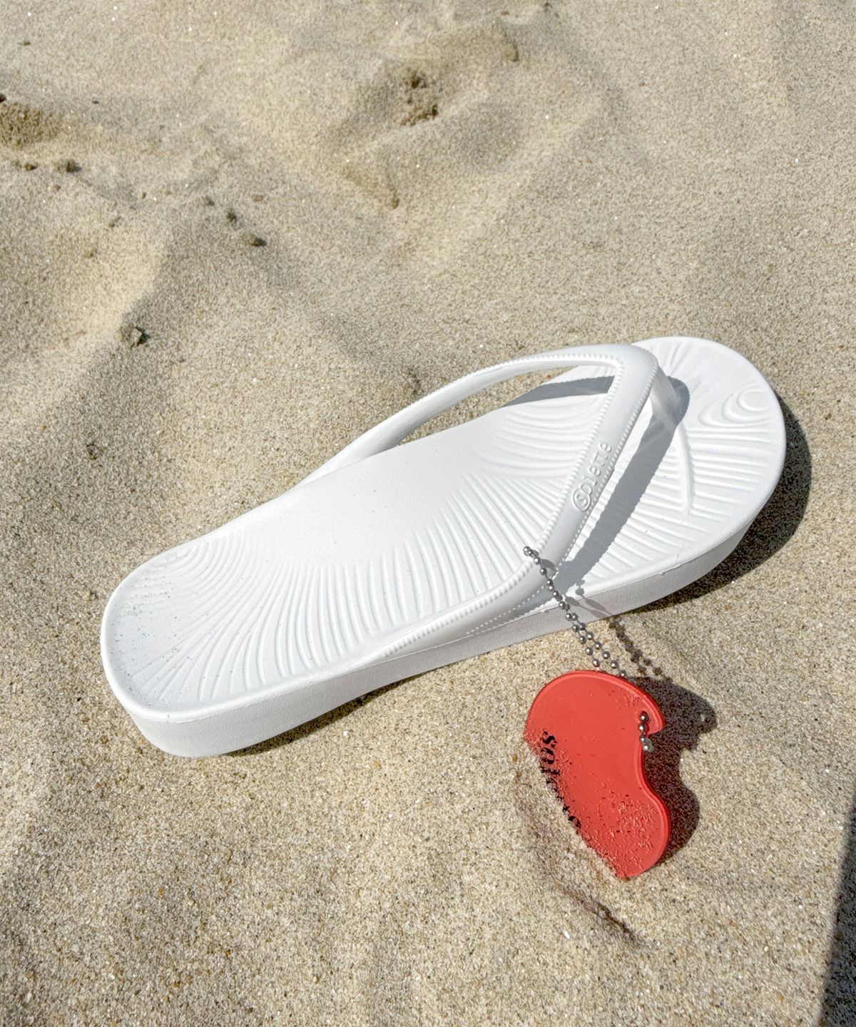 솔레뜨(SOLETTE) MULGYEOL flip flop_White