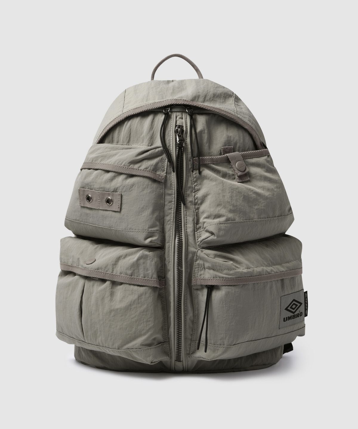 엄브로(UMBRO) 블리츠 백팩 미니 (15L) 카키 베이지 UR323CBP80