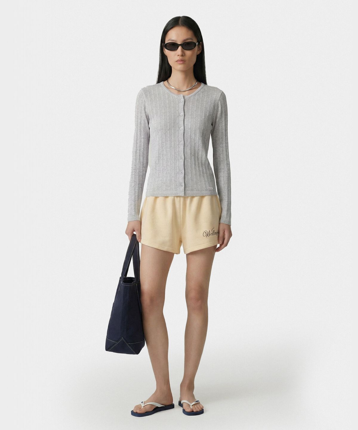 스포티앤리치(SPORTY&RICH) 애비뉴 디스코 쇼츠 옐로우 R265AW7002