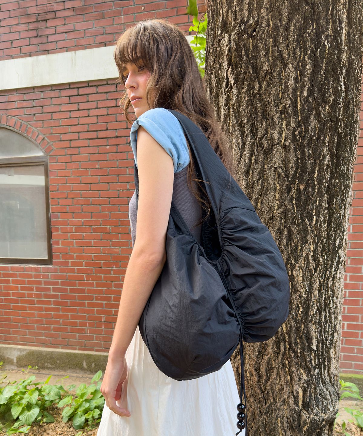 다이애그널(DIAGONAL) BEADED DROP BAG (black)