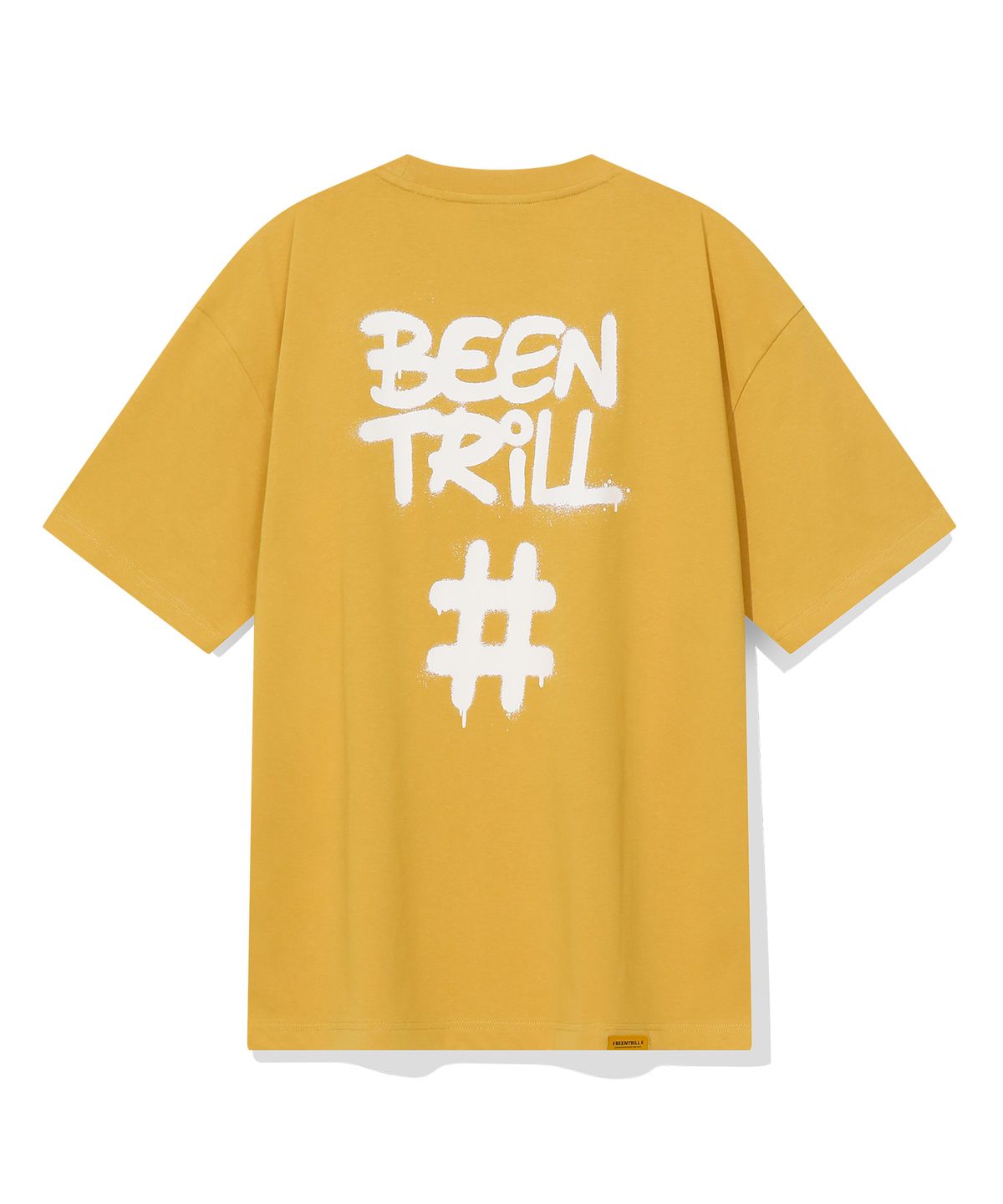 빈트릴(BEENTRILL) 스프레이 해시태그 오버핏 반팔티(머스타드)