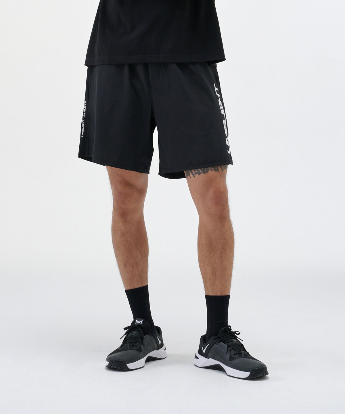 라임라잇 어패럴(LIMELIGHT APPAREL) 애슬릿 라임라잇 빅 로고 라이너 쇼츠 (블랙/화이트)