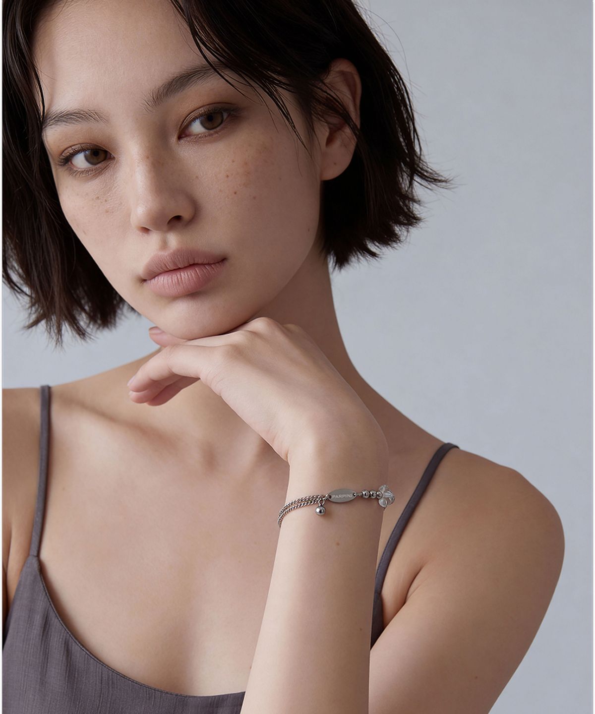 파르피니(PARPINI) 써지컬 스틸 볼 클리어 쿼츠 레이어드 브레이슬릿