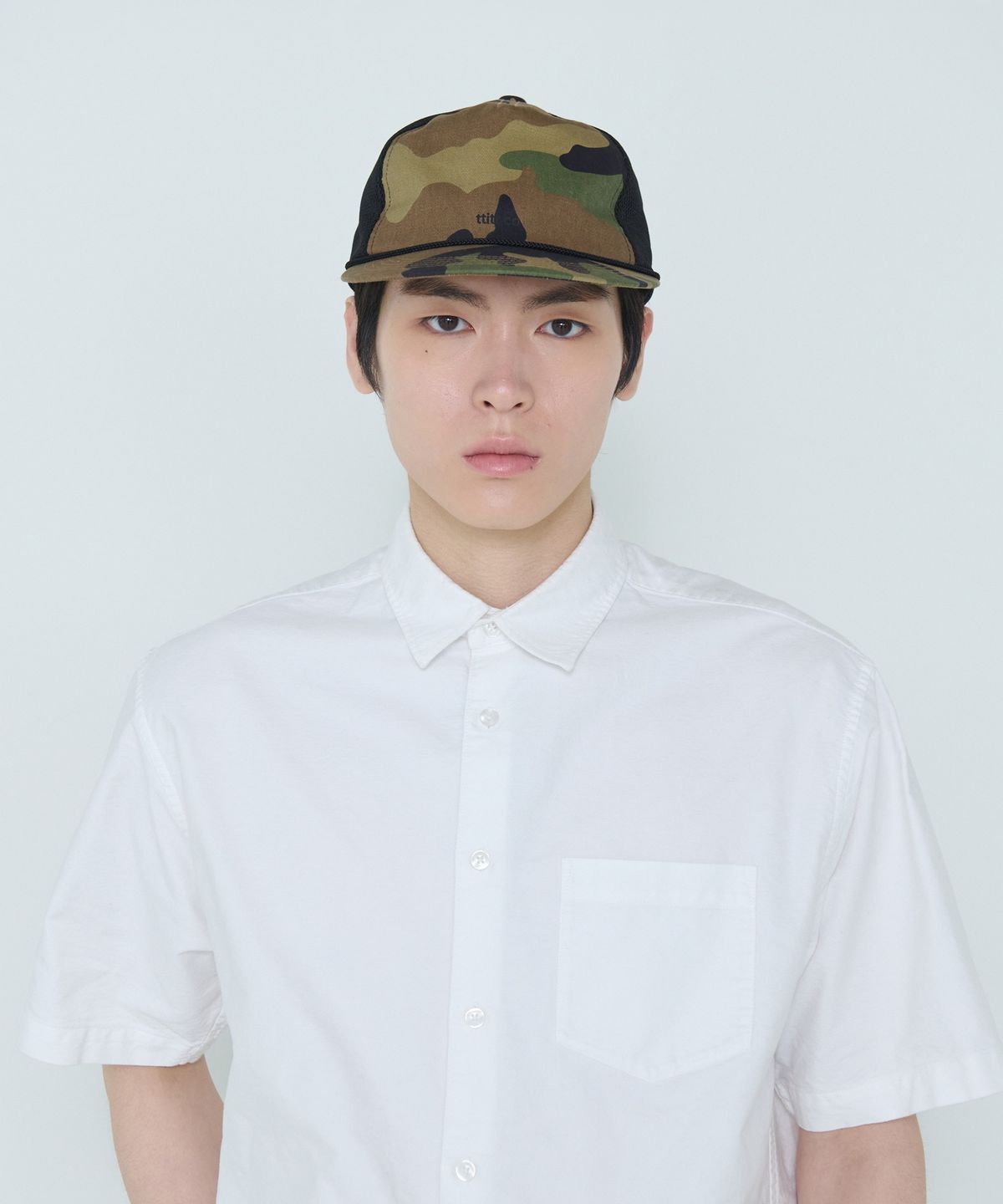 더씽인데어데어(THE THING IN THEIR THERE) Camo Rope Trucker Cap