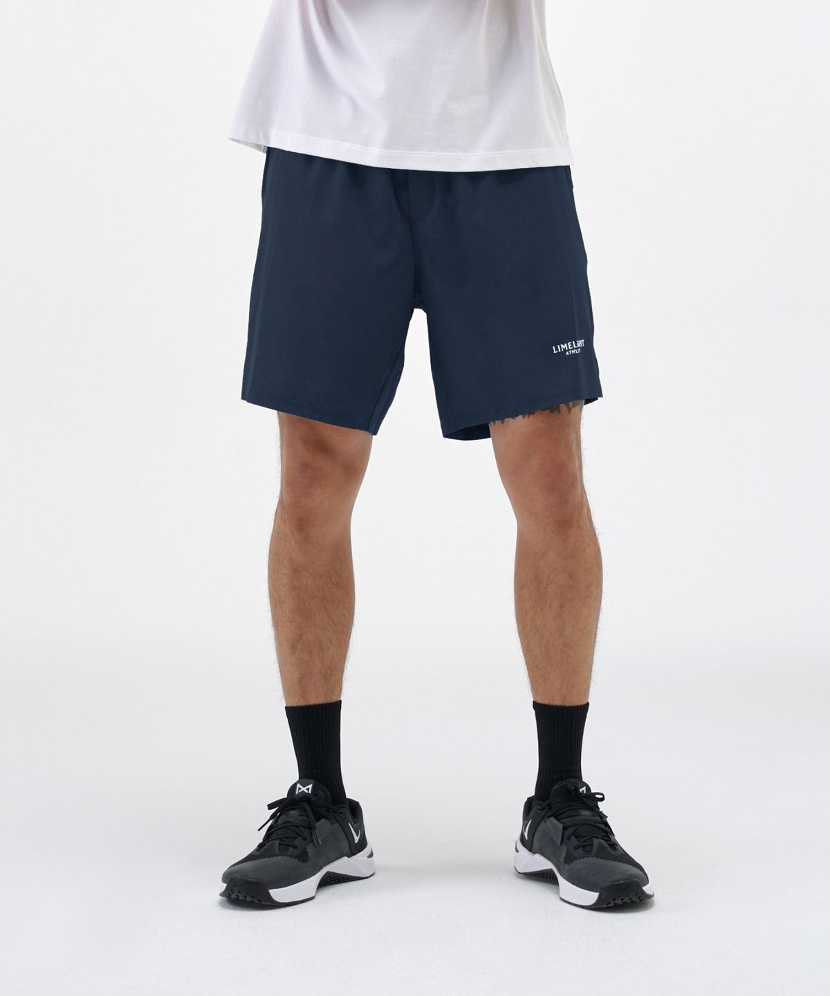 라임라잇 어패럴(LIMELIGHT APPAREL) 애슬릿 스몰 로고 라이너 쇼츠 (네이비/화이트)