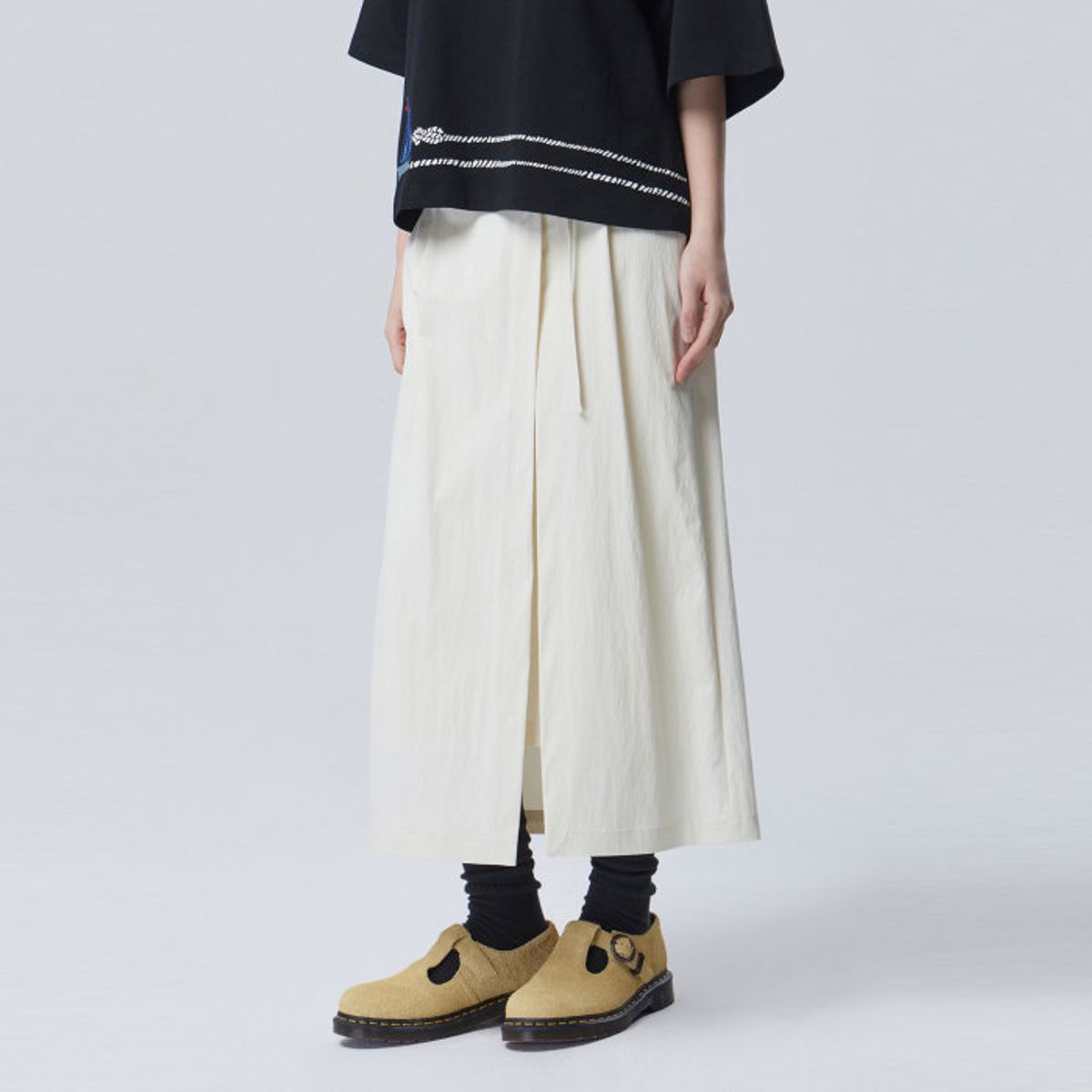 베네통(BENETTON) 핀턱 랩 레이어드 스커트_BASK03611BG