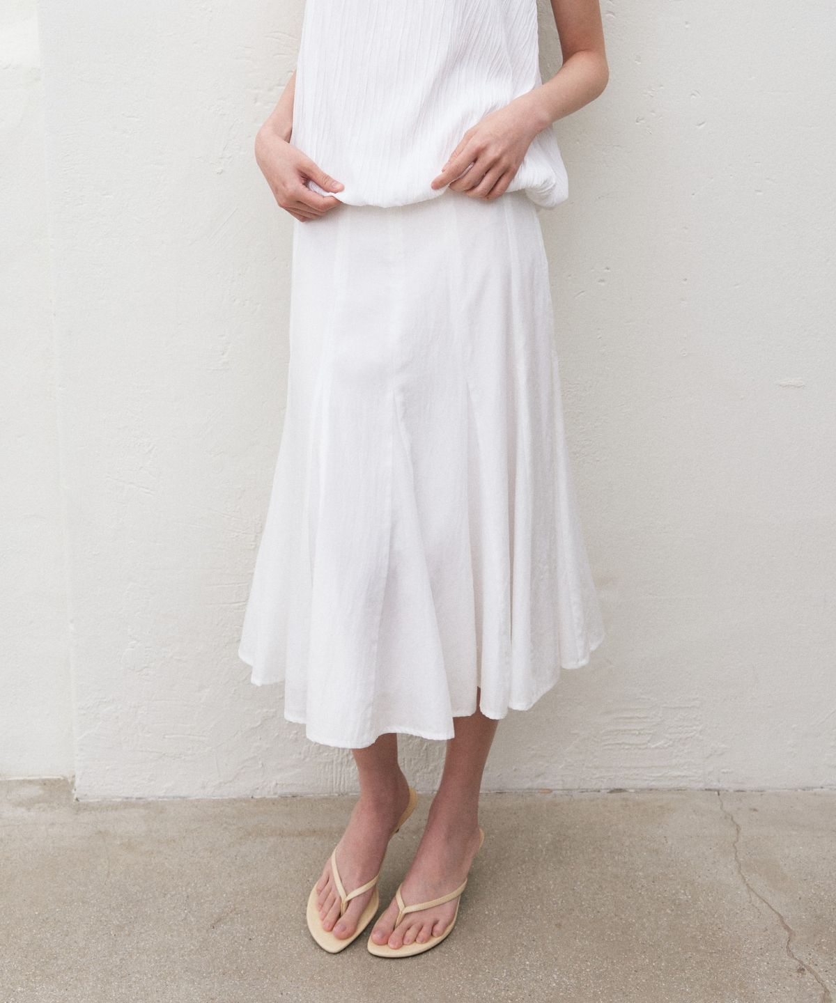 망고매니플리즈(MANGO MANY PLEASE) FLUTT FLARE SKIRT_WHITE
