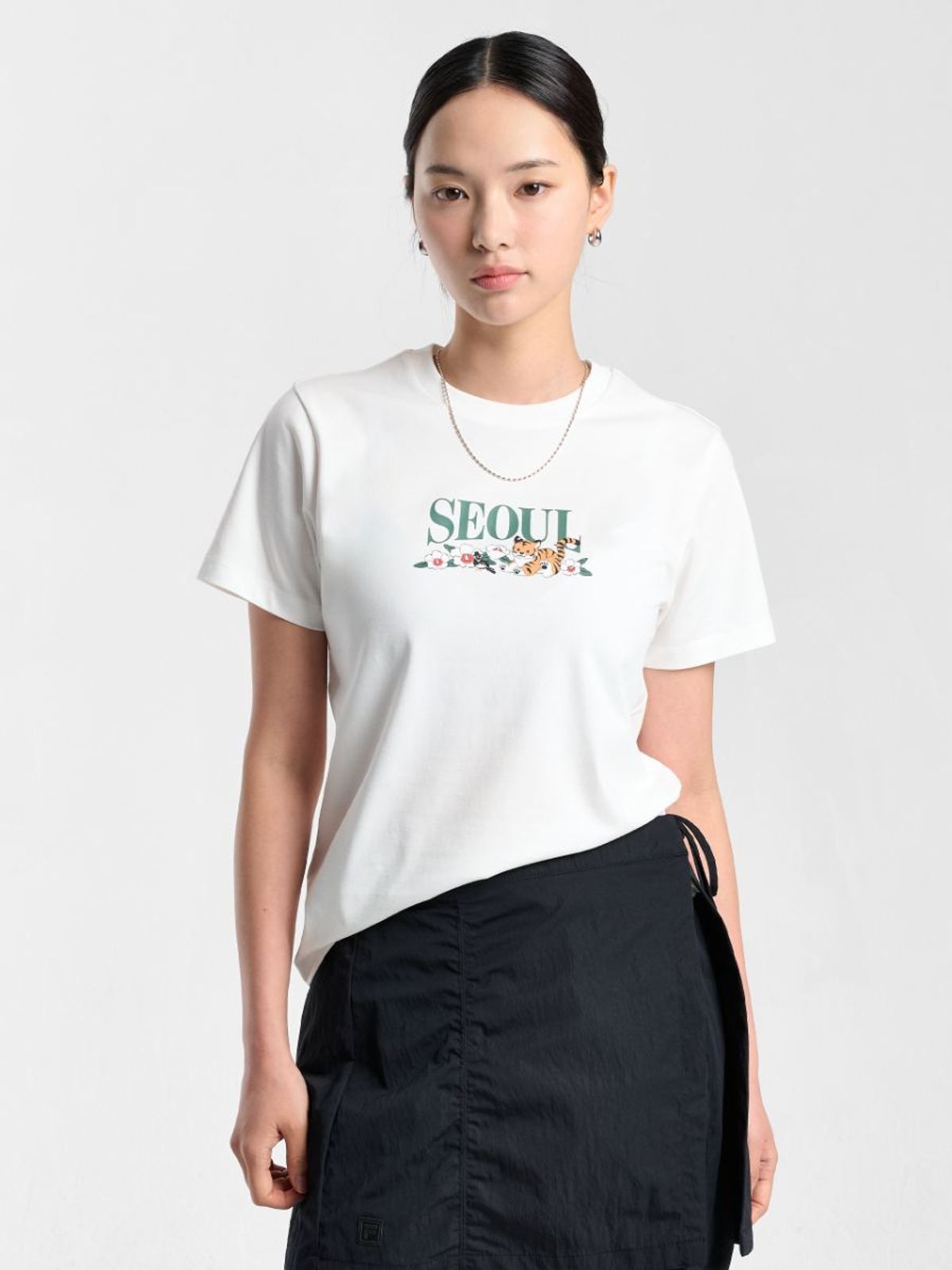 휠라(FILA) 여성 서울 익스클루시브 반팔티(FS262RS01F027191)