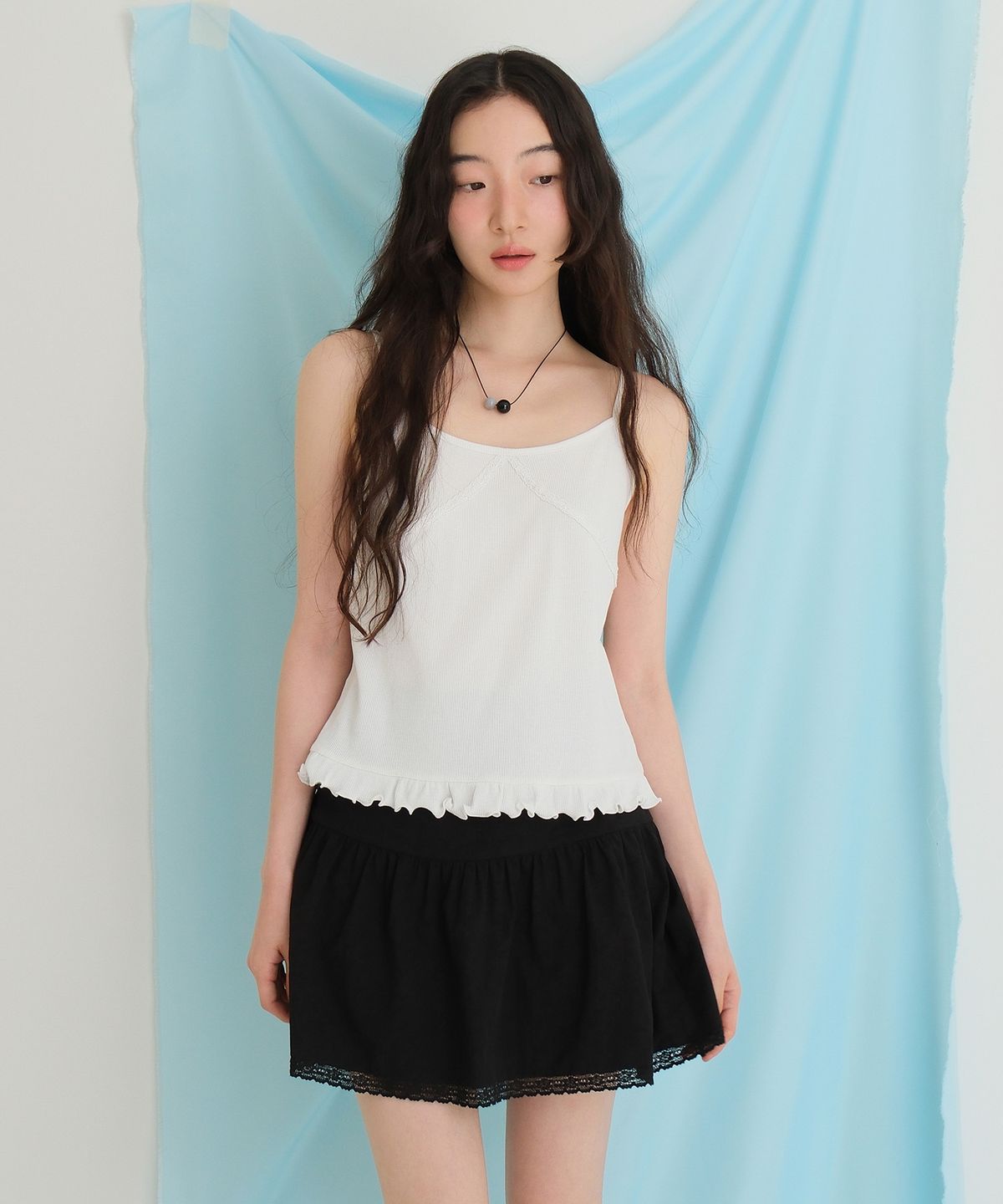 모의(MOUI) Frill ribbed sleeveless Tee (IVORY)
