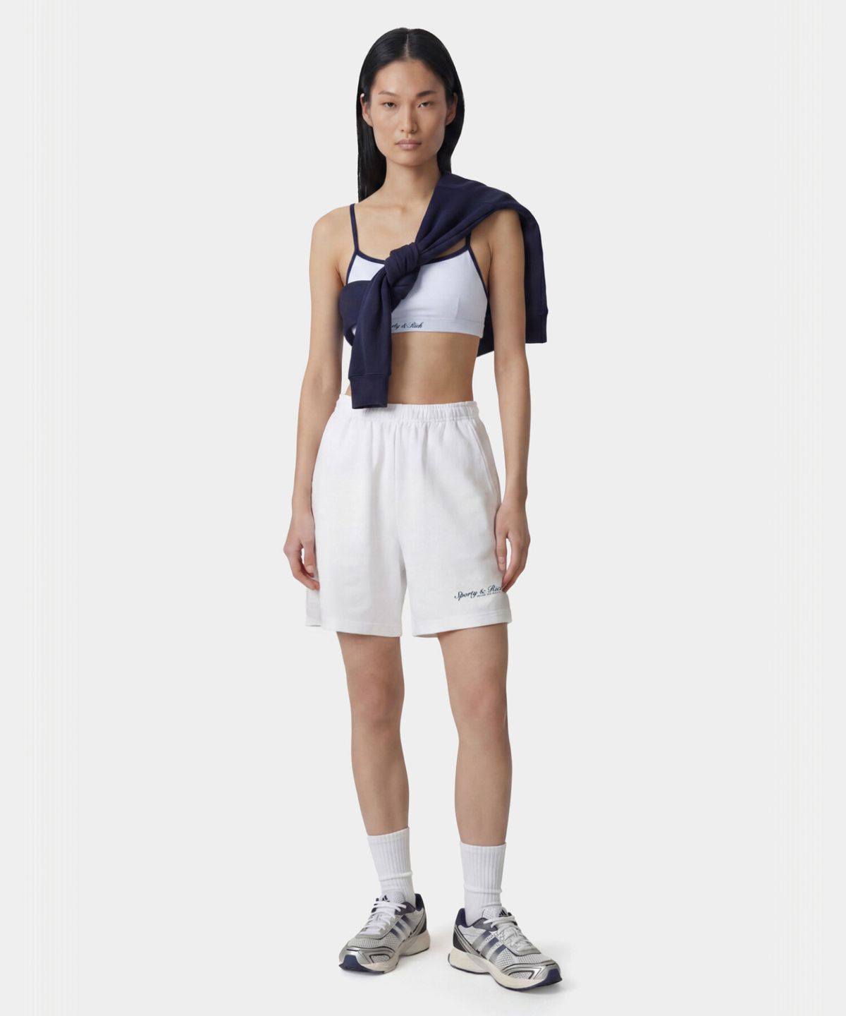 스포티앤리치(SPORTY&RICH) 시라큐스 짐 쇼츠 남여공용 - 화이트 R265AU7003