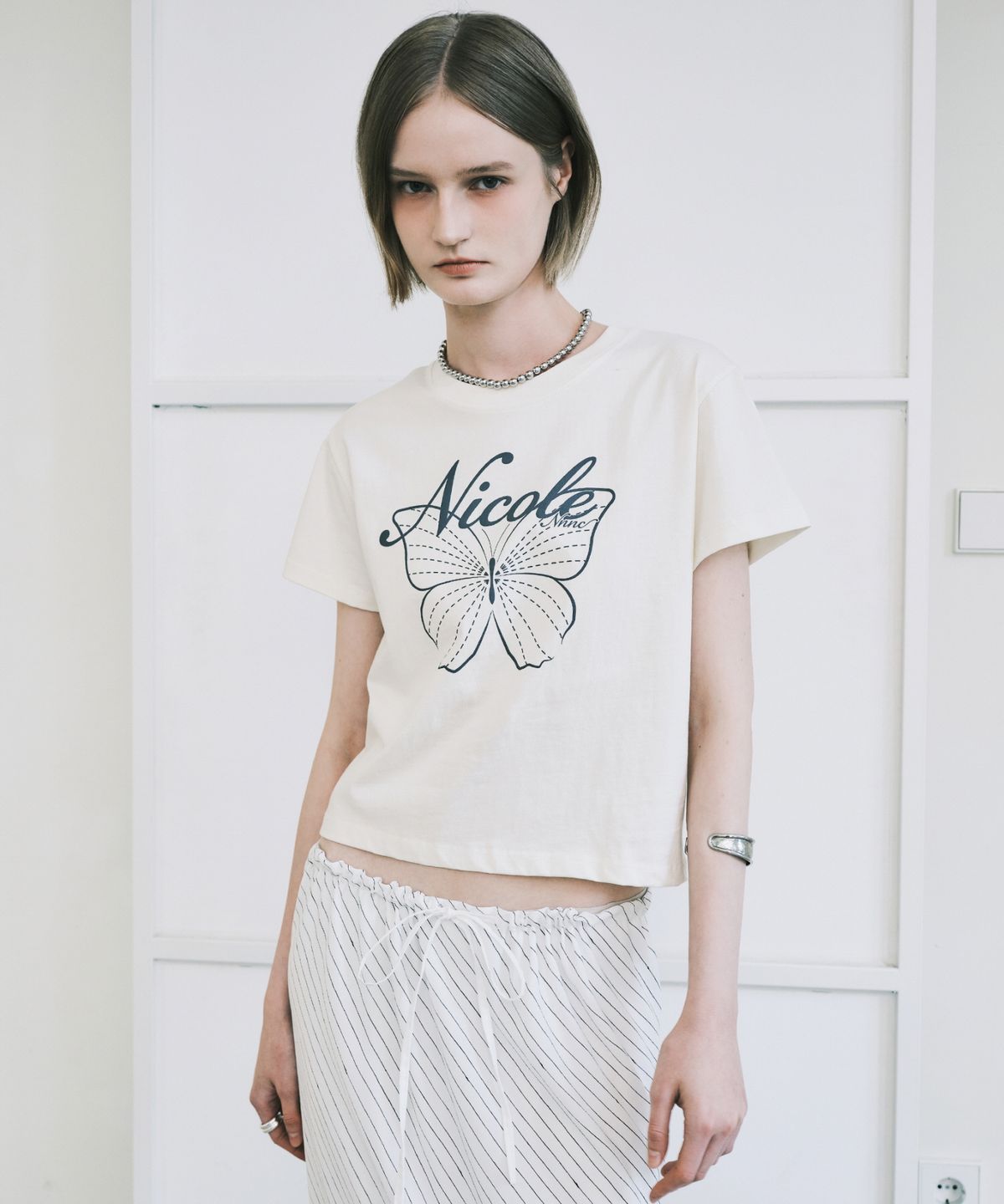 닉앤니콜(NICK&NICOLE) NICOLE BUTTERFLY CROP TOP_CREAM CHARCOAL