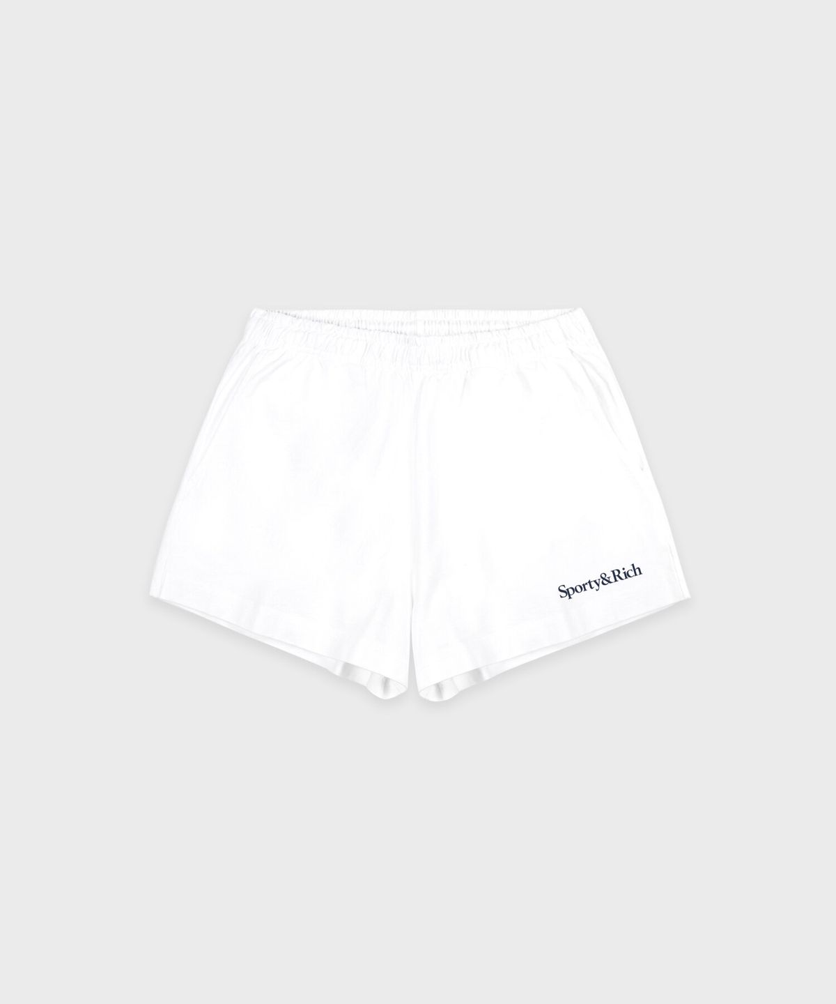 스포티앤리치(SPORTY&RICH) 세리프 로고 자수 디스코 쇼츠 - 화이트 R265AW7006