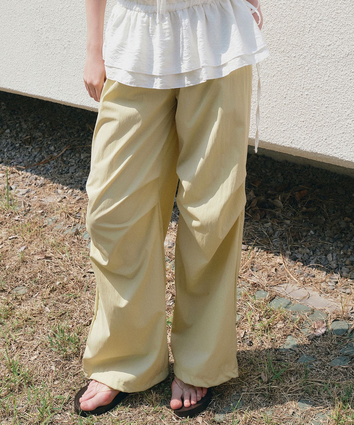 로에일(LOEIL) Parachute string nylon pants_Lemon