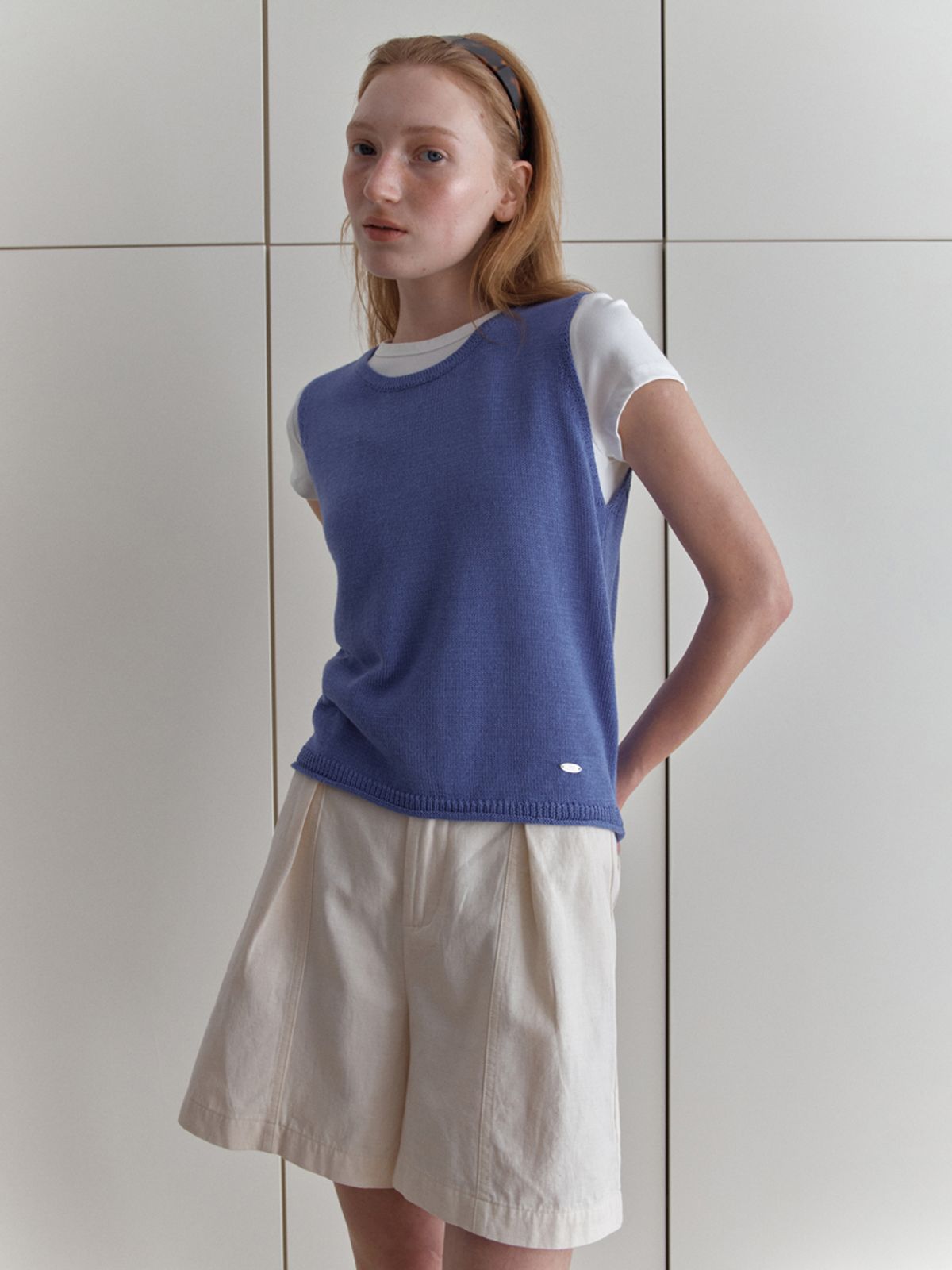 엘씨브이(LCVE) DIAGONAL BUTTONS SLEEVELESS KNIT_BLUE
