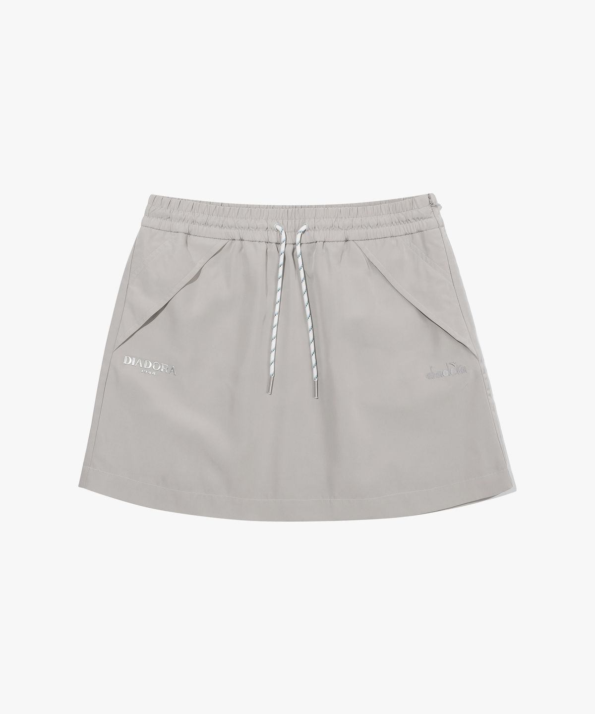 디아도라(diadora) 스트링 포인트 우븐 스커트 BEIGE