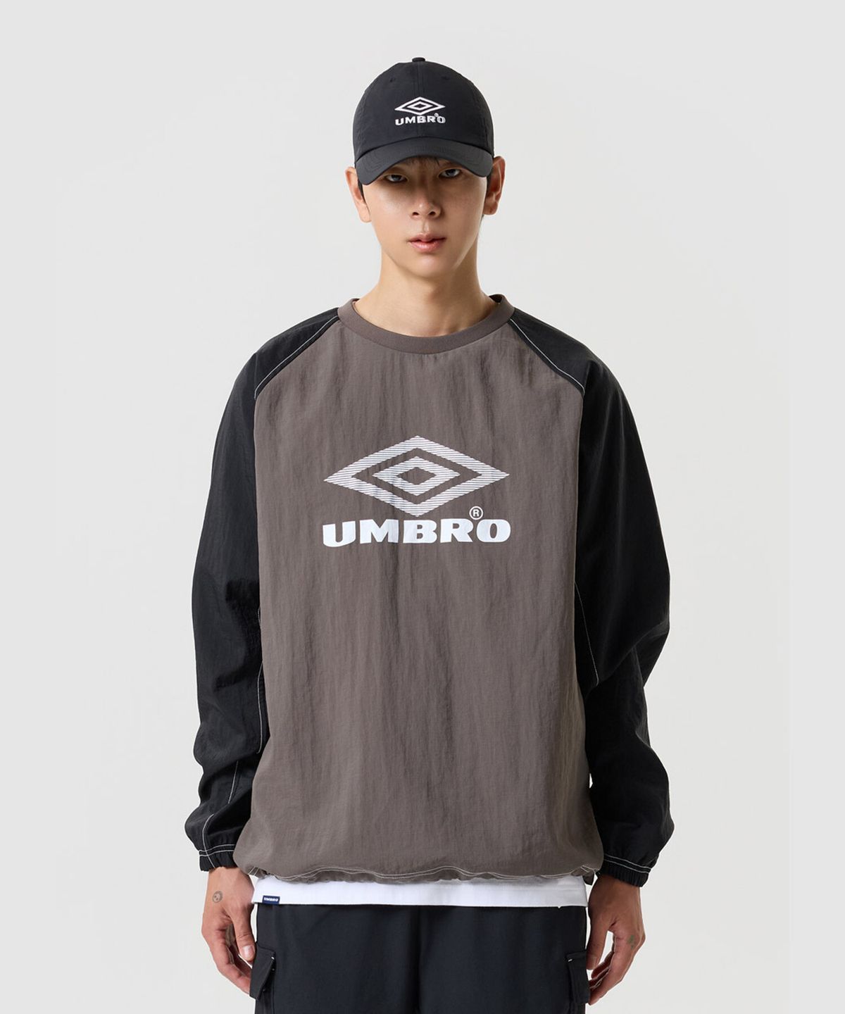 엄브로(UMBRO) 크리스피 타슬란 긴팔 피스테 브라운 UR324CWT92