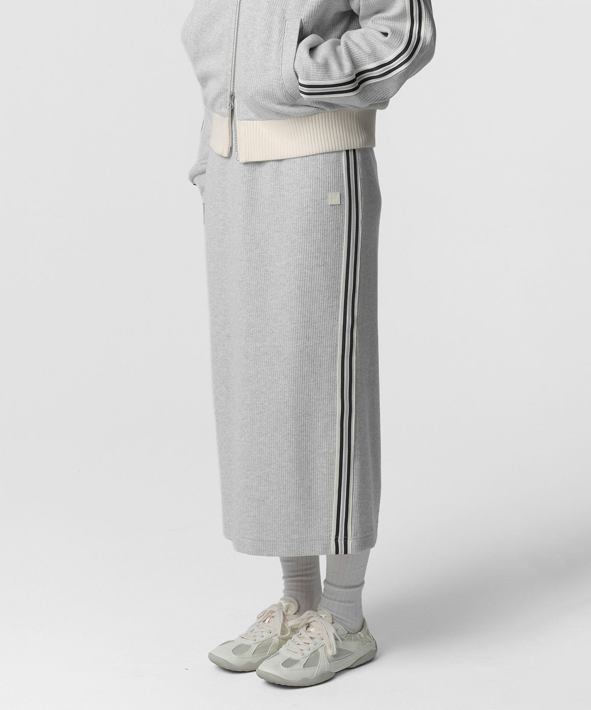 휠라(FILA) 1911 니트트랙 스커트 멜란지