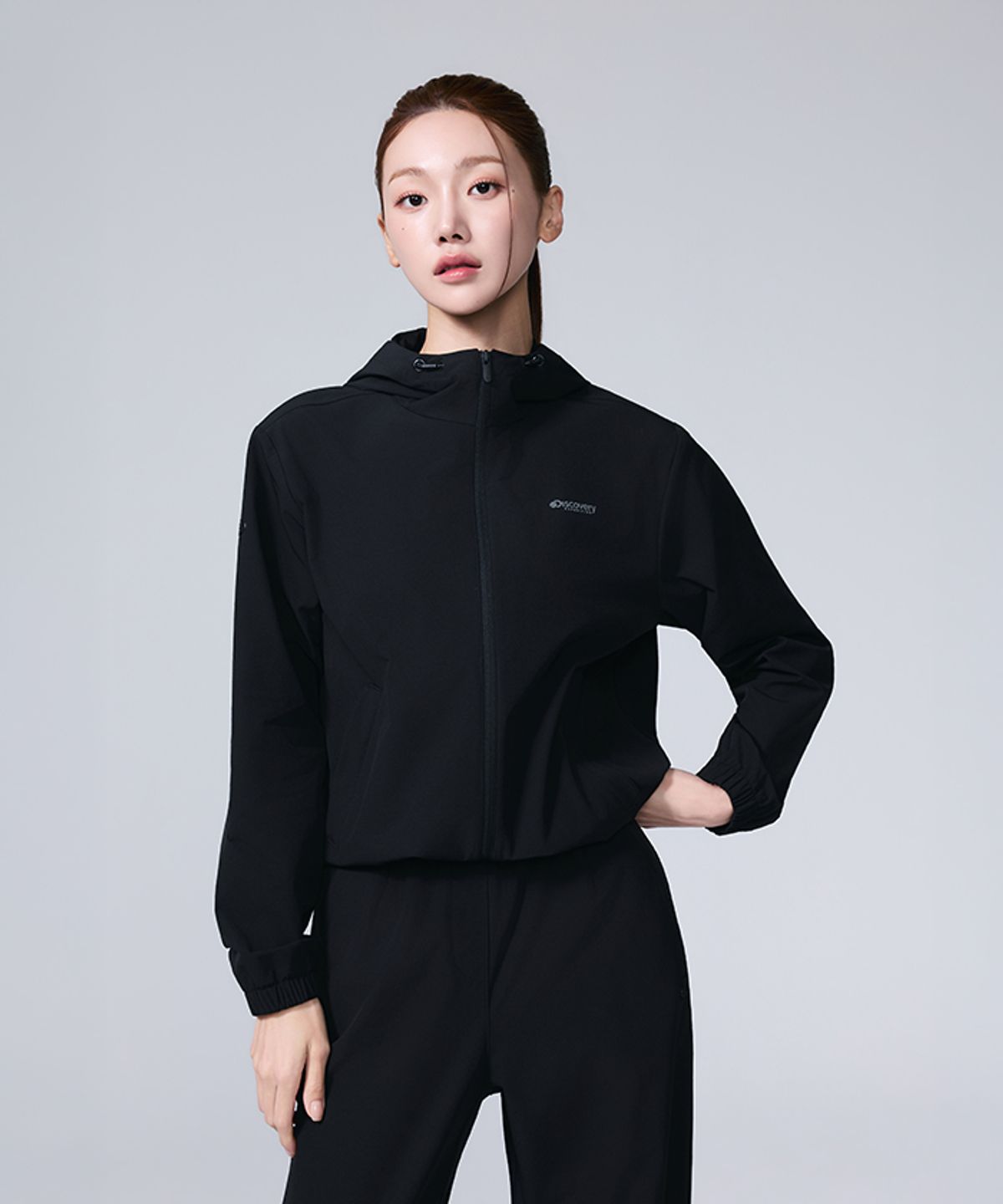 디스커버리 익스페디션(DISCOVERY EXPEDITION) 여성 스트레치 우븐 후드 자켓 (SET-UP) (BLACK)