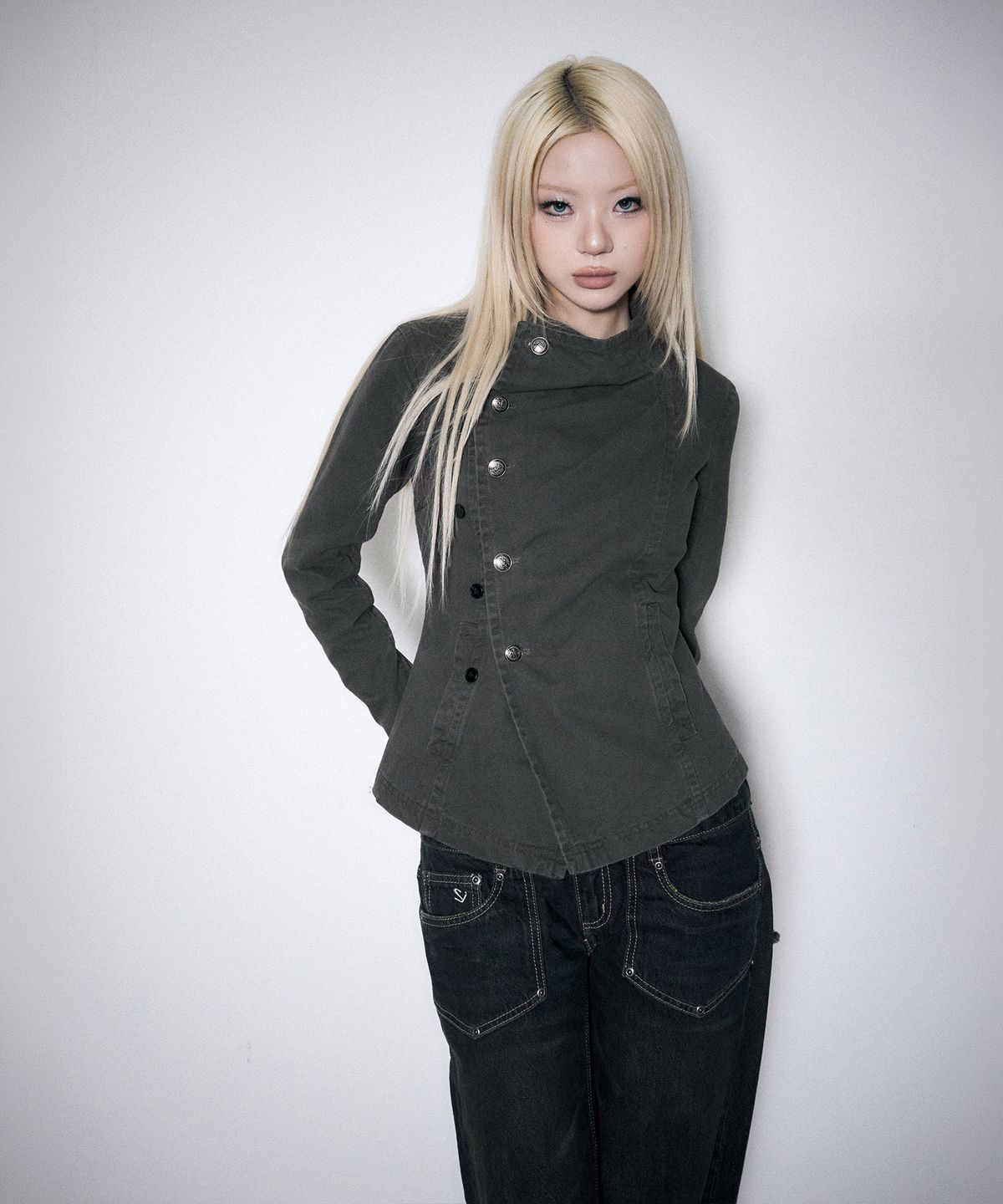스키즘 인듀싱(SCHISM INDUCING) ASYMMETRIC BUTTON COWL JACKET KHAKI