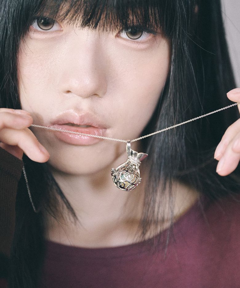 vintage potion necklace