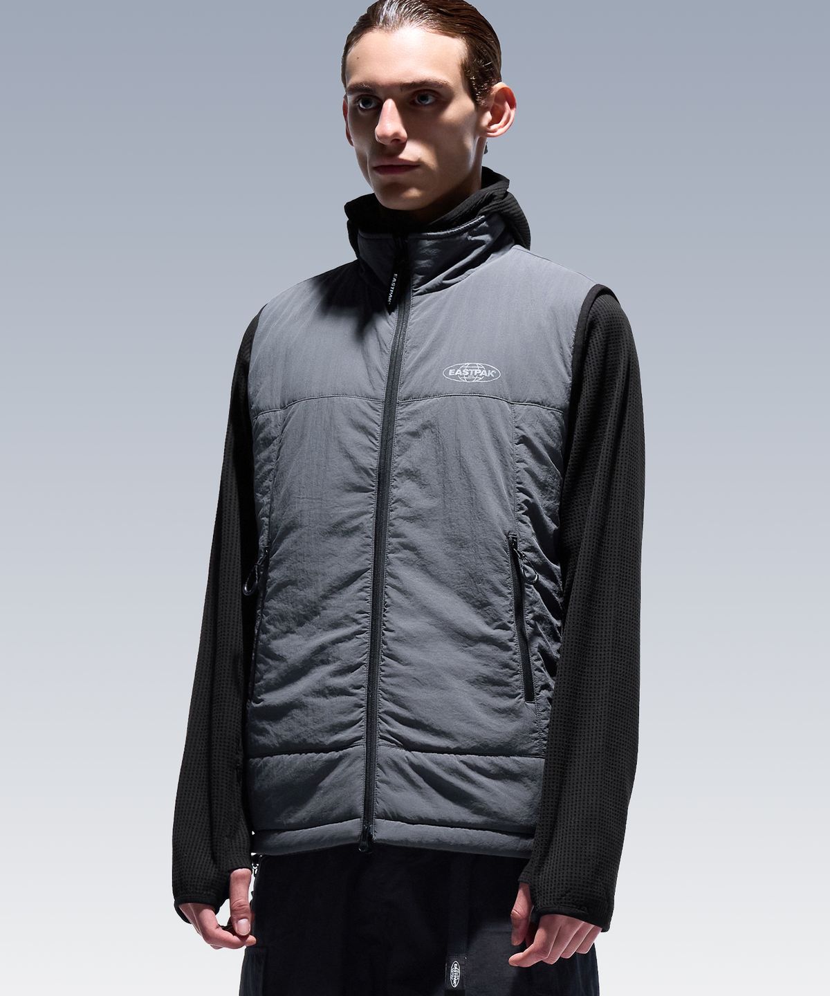 이스트팩(EASTPAK) 리버시블 플리스 베스트 GREY