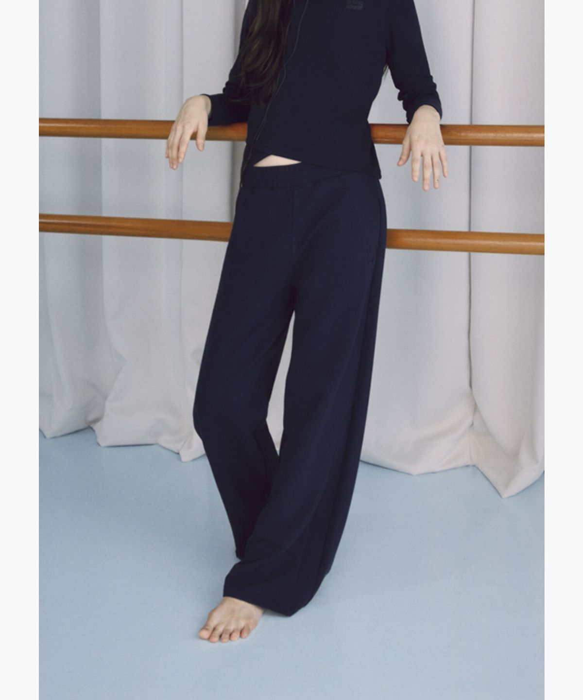 르꼬끄(LECOQ) 여성 소프트 와플 트랙팬츠 - 다크 네이비 QR322OFP81