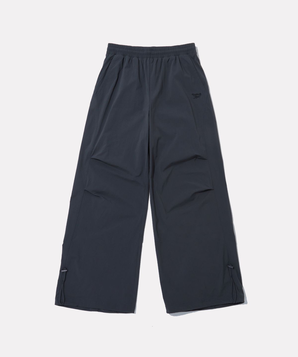 리복(REEBOK) 올커버 스트레치 2WAY 팬츠 (W) - 차콜