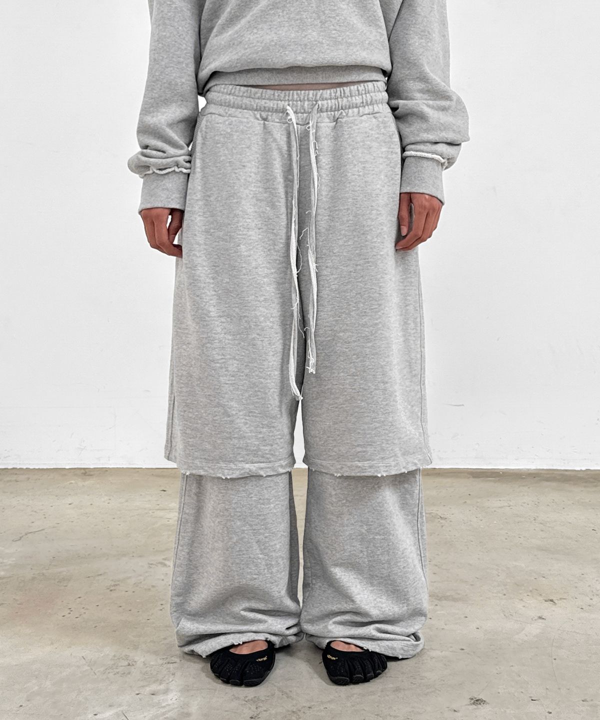 샌드릭(SANDRIC) Layered sweat Pants_Melange grey