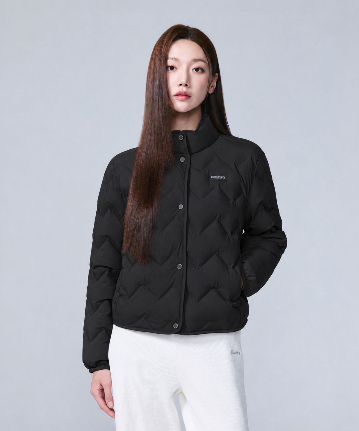 디스커버리 익스페디션(DISCOVERY EXPEDITION) 여성 티베른 크롭 튜브 구스다운 경량패딩 (BLACK)