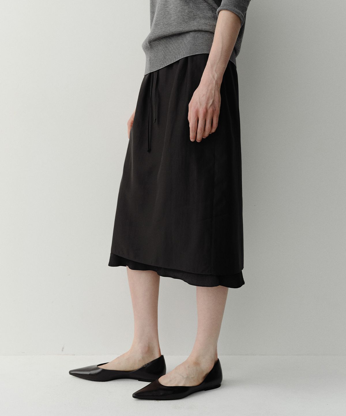 이아(EAAH) SHEER LAYERED BANDING SKIRT (BLACK)