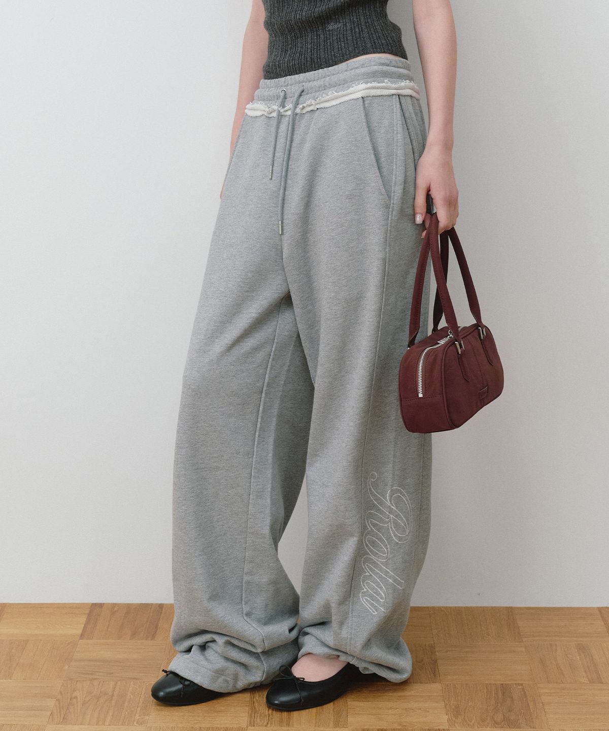 로라로라(ROLAROLA) STITCH LOGO CURVED SWEAT PANTS MELANGE GRAY