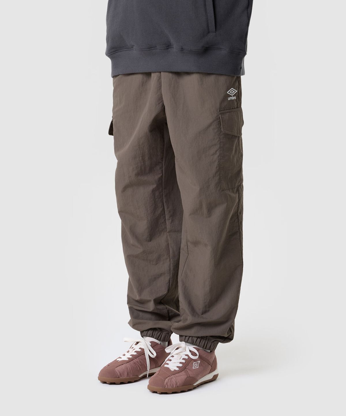 엄브로(UMBRO) 클래식 우븐 조거 팬츠 브라운 UR323CPT94