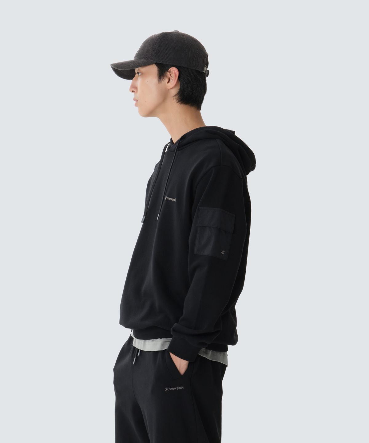 스노우피크 어패럴(SNOWPEAK APPAREL) 랜드 포켓 후드 티셔츠 (S26FMFHD60) Black