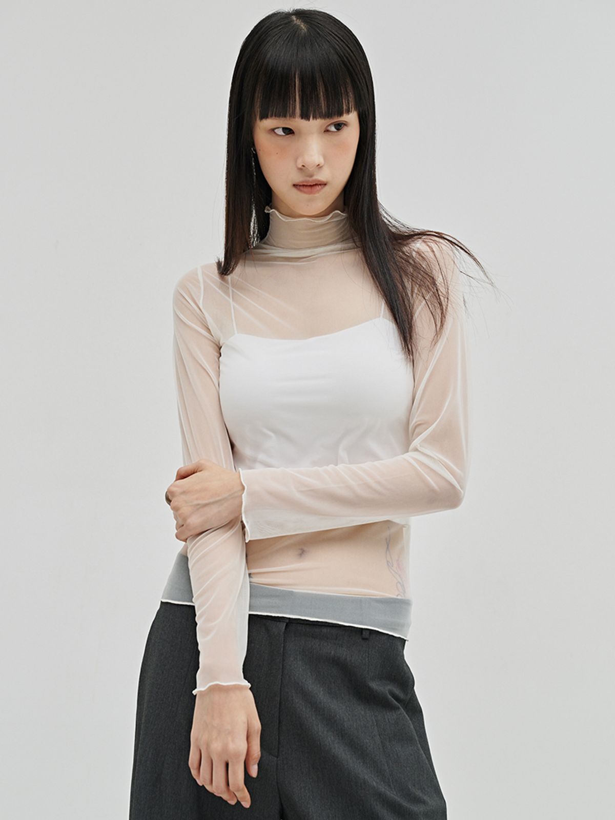 누브(NOUVE) 시어 하이넥 롱슬리브 티셔츠 - 크림 / Sheer High Neck Long Sleeve T-Shirt - Cream