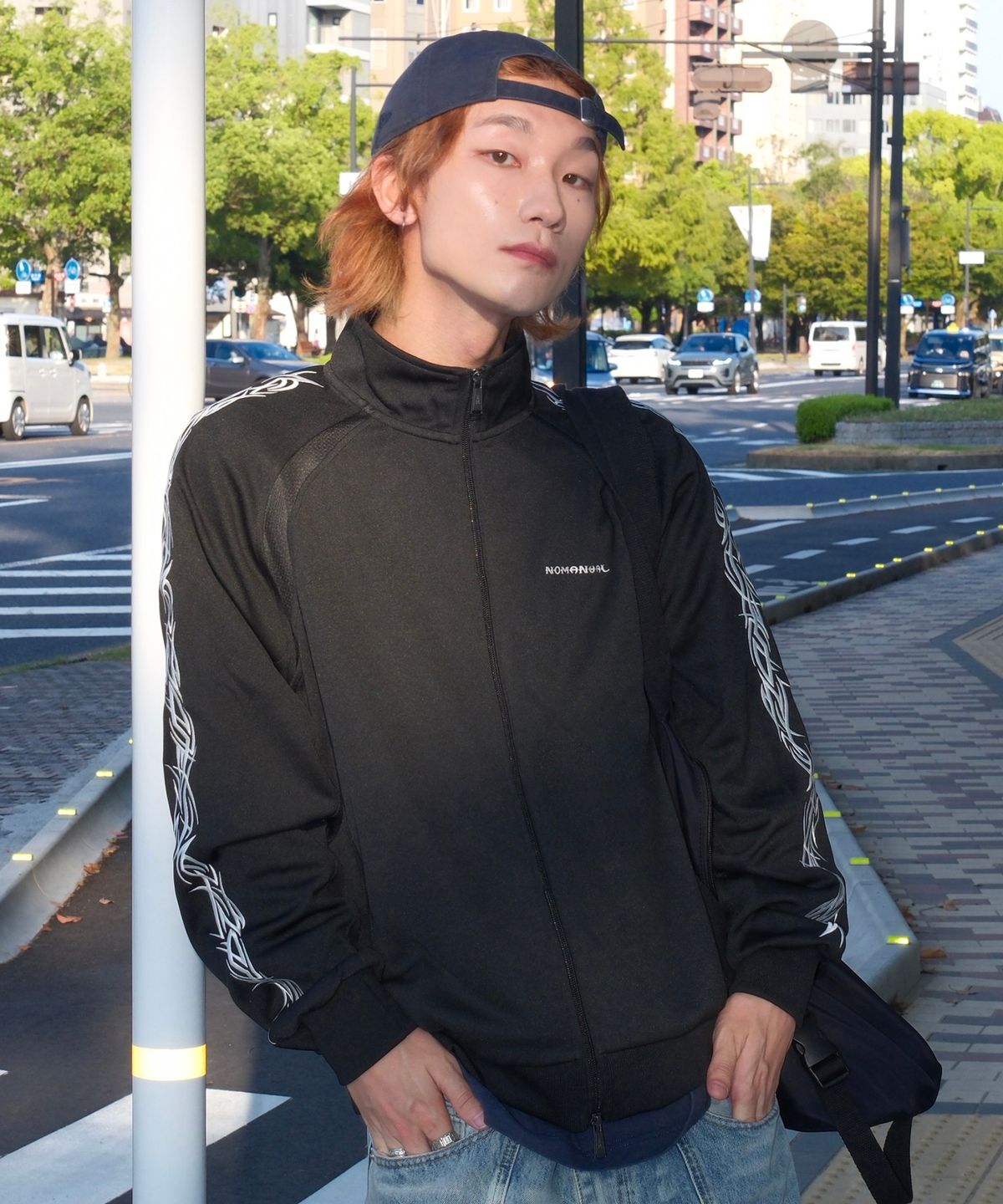 노매뉴얼(NOMANUAL) EMBROIDERED TRIBAL TRACK TOP - BLACK