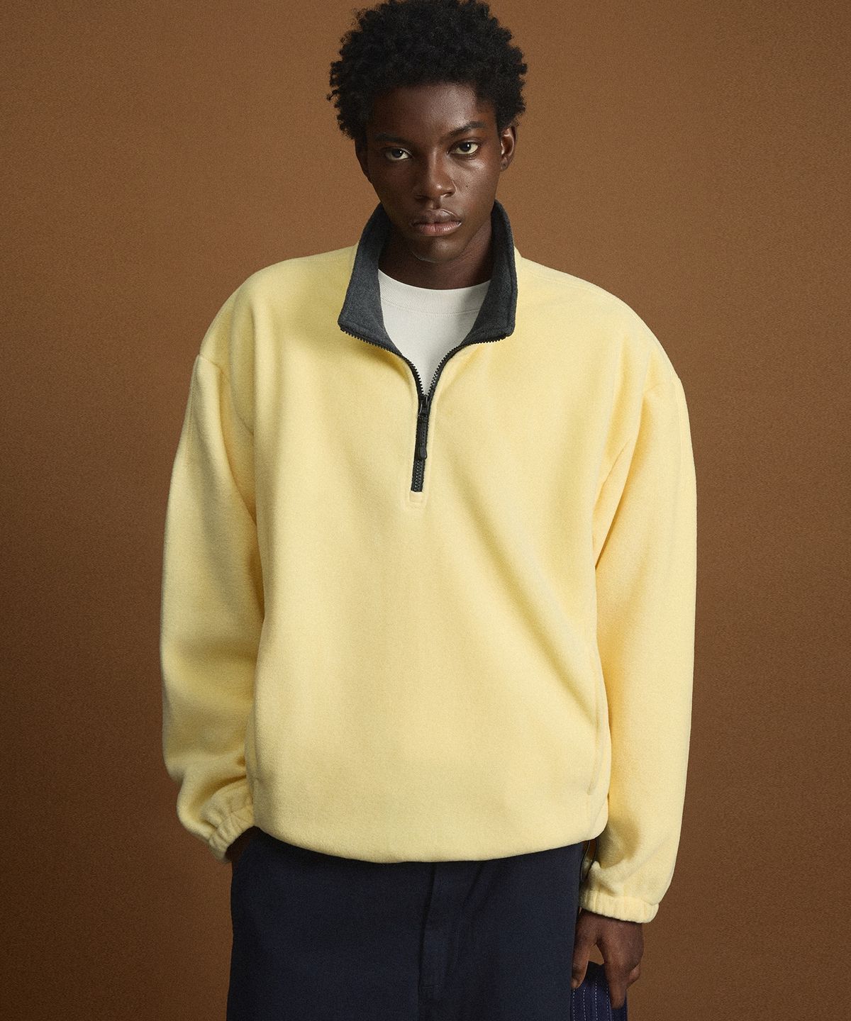 티엔지티(TNGT) Oversized Fleece Half Zip-Up (Butter Yellow) TNTS6F100Y2