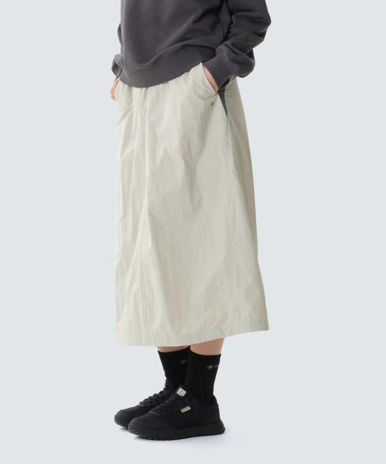 경량 타슬란 컬러블럭 스커트 (S26FWLSK41) Light Beige