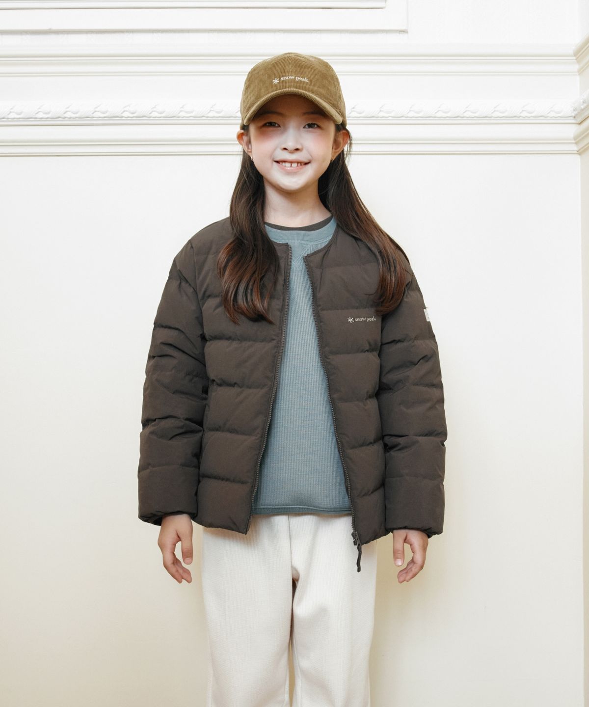 스노우피크 어패럴(SNOWPEAK APPAREL) 키즈 경량 타슬란 라운드넥 경량 다운 자켓 (S26WKLDJ82) Choco Brown