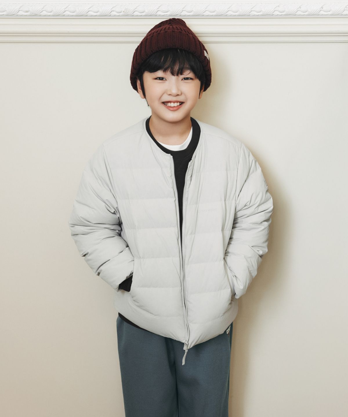 스노우피크 어패럴(SNOWPEAK APPAREL) 키즈 경량 타슬란 라운드넥 경량 다운 자켓 (S26WKLDJ82) Stone Gray