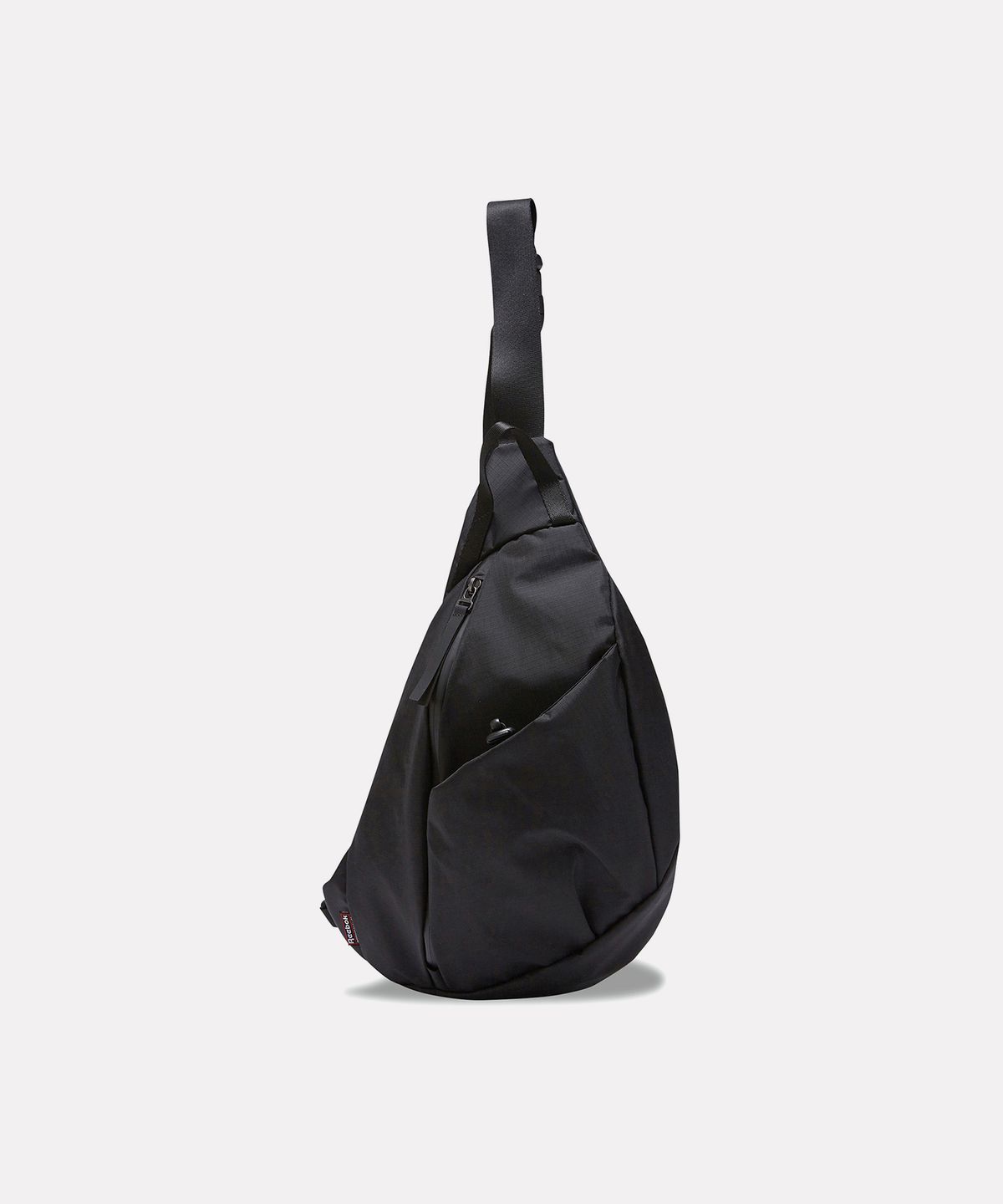 리복(REEBOK) 그리드 나일론 슬링백 - 블랙
