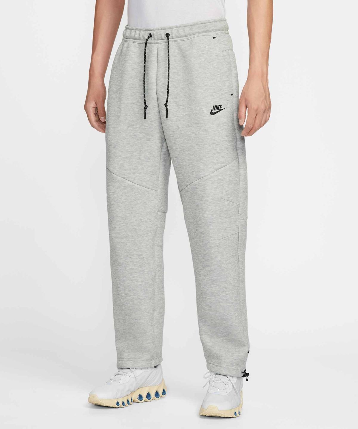 나이키(NIKE) 테크 오픈 헴 플리스 팬츠 M - 다크 그레이 헤더:블랙 / IM0698-063