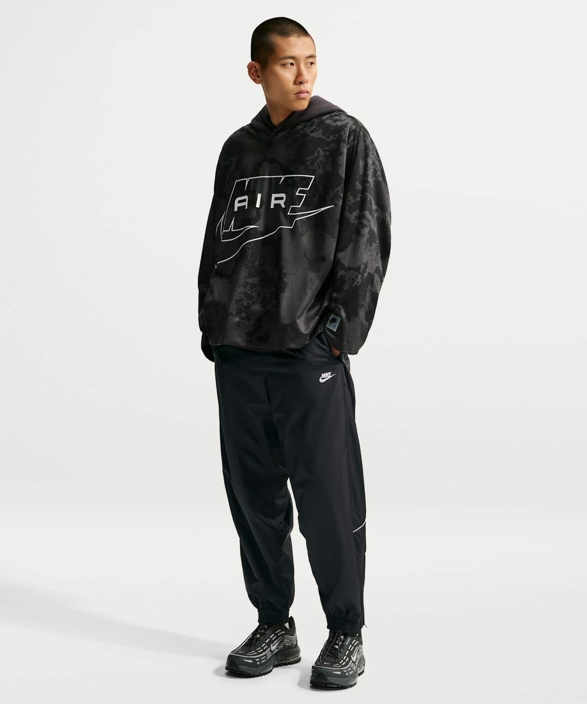 나이키(NIKE) 윈드러너 웨더라이즈드 팬츠 M - 블랙:화이트 / IQ5556-010