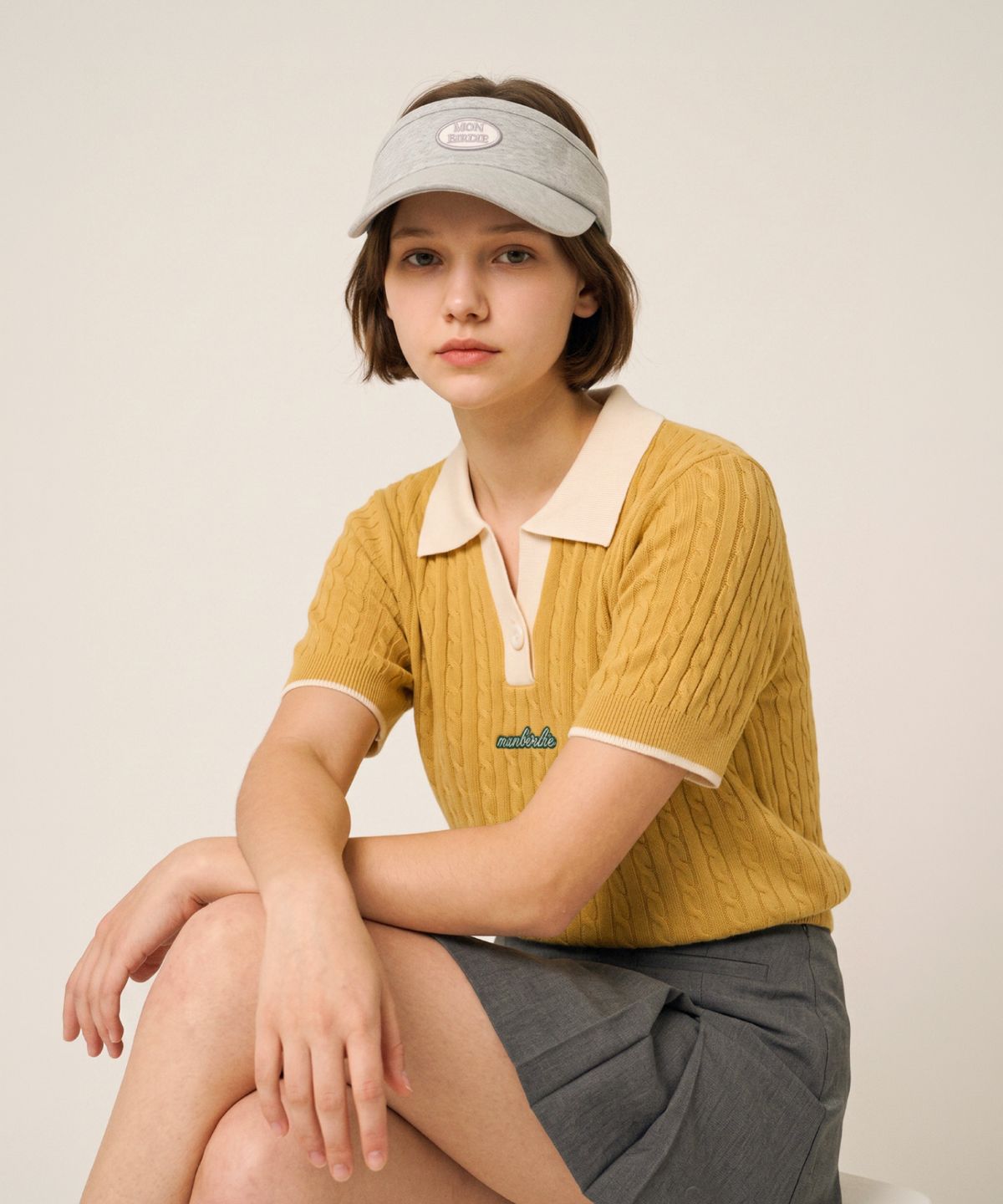 몽버디 골프(MONBIRDIE GOLF) 케이블 배색 카라넥 니트_MUSTARD