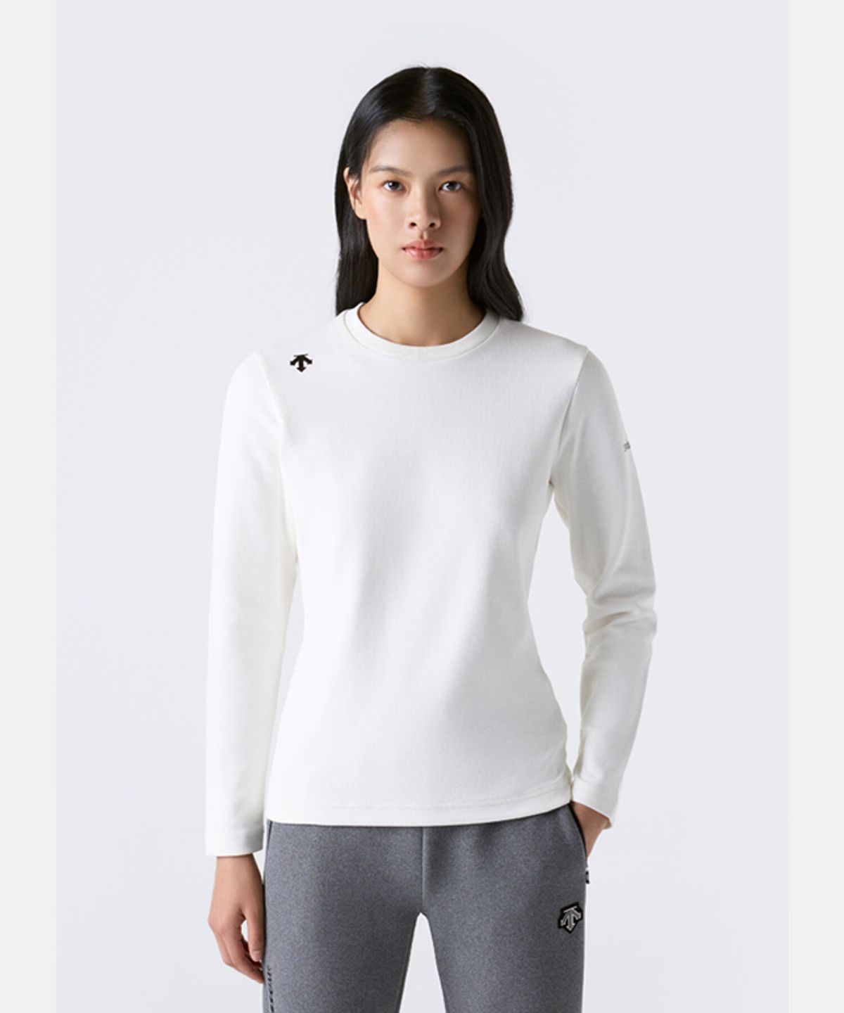 데상트(DESCENTE) 스위스 스키 기모 긴팔 티셔츠 아이보리 SR423STLO3
